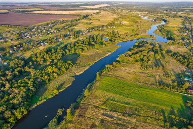 Drone aerial view over summer sunset river Ros landscape, Ukraine.