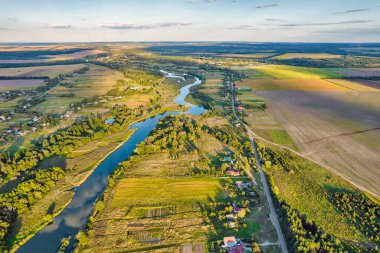 Drone aerial view over summer sunset river Ros landscape, Ukraine.