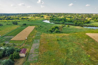 Drone aerial view over summer sunset river Ros landscape, Ukraine.