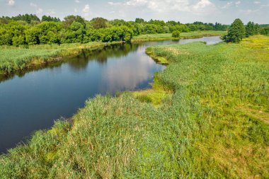 Drone aerial view over summer sunset river Ros landscape, Ukraine.