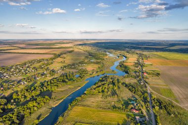 Drone aerial view over summer sunset river Ros landscape, Ukraine.