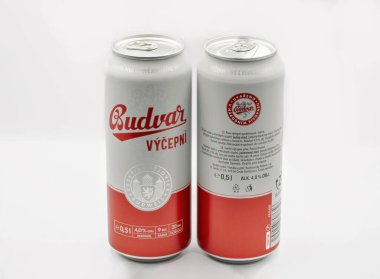 Kyiv, Ukraine - June 18, 2022: Studio shoot of Budvar Vycepni beer cans closeup against white. Budweiser Budvar is a brewery in the Czech city of Ceske Budejovice.