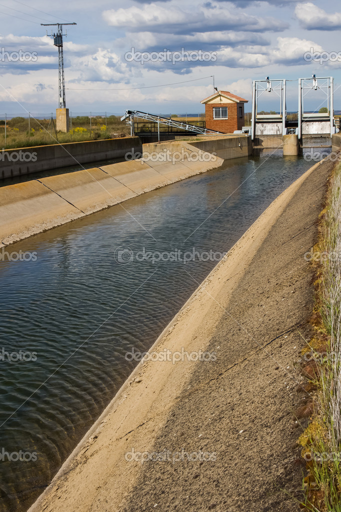Gates in irrigation canal — Stock Photo © siur 27680491