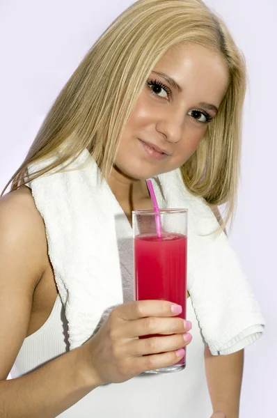 Woman with a refreshing strawberry drink — Stock Photo, Image