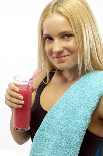 Woman with a refreshing strawberry drink — Stock Photo, Image