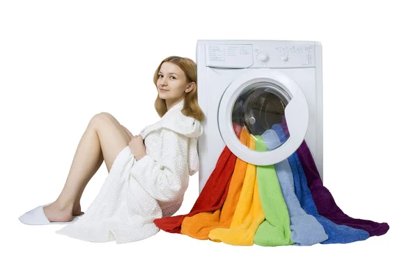Beleza menina e máquina de lavar roupa com coisas coloridas para wa — Fotografia de Stock