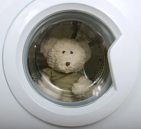 Fluffy toy in the washing machine — Stock Photo, Image