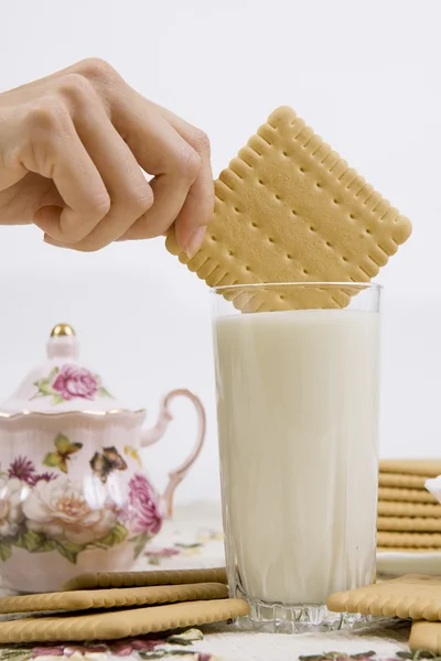 Glass of buttermilk and cookies — Stock Photo, Image