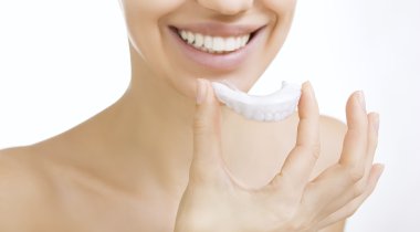 smiling girl with tooth tray clipart
