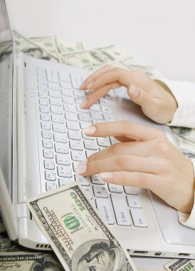 Paid job: Female hands typing on white computer keyboard clipart