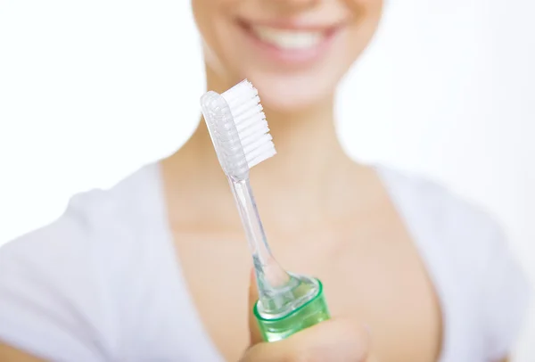 Closeup girl with toothbrush cleaning teeth at home — Stock Photo, Image