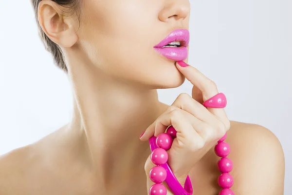 Beautiful girl with bright pink make-up and accessory close up — Stock Photo, Image