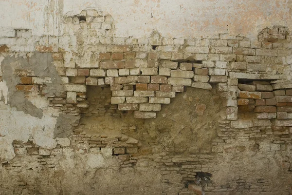 Gammal tegelvägg: Grunge väggen i det gamla huset. Texturerat bak — Stockfoto