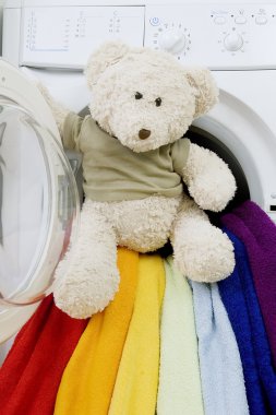 Washing machine, toy and colorful things to wash clipart