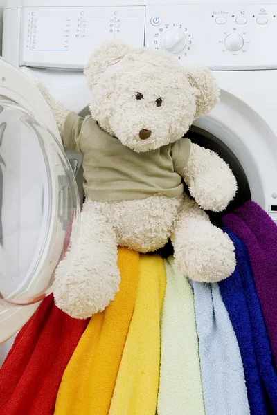 Washing machine, toy and colorful things to wash — Stock Photo, Image