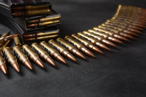 5.56 mm NATO mühimmatı, makineli tüfek mermisi kemeri, şarjörlerde tüfek mermisi