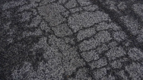 Top View Old Asphalt Road Wet Cracks Worn Road Cracks — Stock Photo, Image