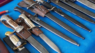 Cold steel weapons - Bayonets, dirks, daggers, stilettos,  cutlasses, hangers, collection. Cold weapons on display for sale