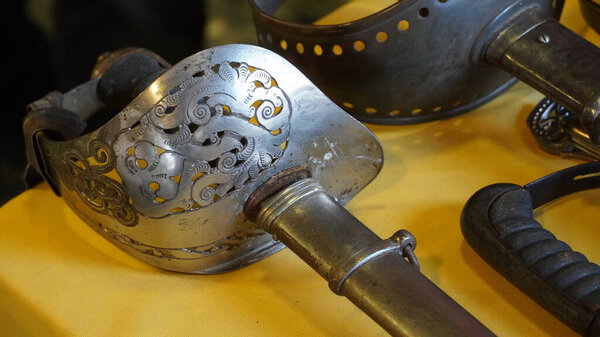 Cold steel weapons - Sabers for sale at local market.