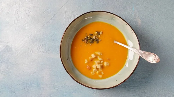 Creamy pumpkin soup with ginger. Healthy organic pumpkin cream soup