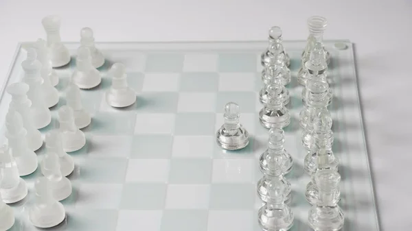 Transparent Chess Figures Reflective Chess Board Pawns Forward One Step — Foto Stock