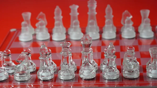 Transparent Chess Figures Starting Position Reflective Chess Board Red Tone — Foto Stock