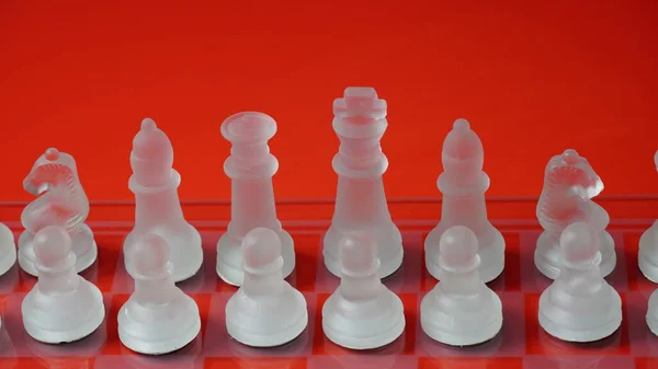 Transparent Chess Figures Starting Position Reflective Chess Board Red Tone — Foto Stock