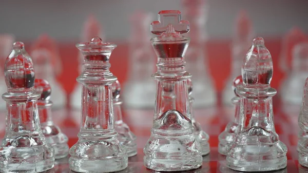 Transparent Chess Figures Starting Position Reflective Chess Board Red Tone — Stock Photo, Image