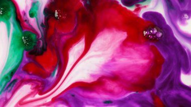 Abstract colors, backgrounds and textures. Oil coloring in milk creating bright colorful abstract backgrounds. Chemical experiment.