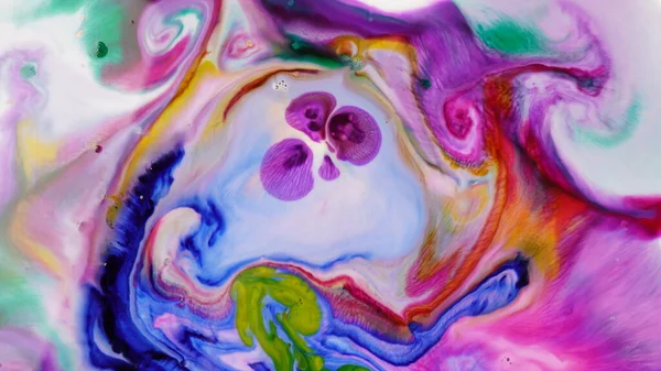 Abstract colors, backgrounds and textures. Oil coloring in milk creating bright colorful abstract backgrounds. Chemical experiment.