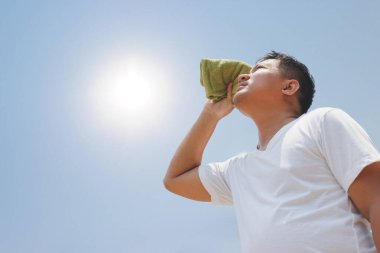 Young man and heat stroke.