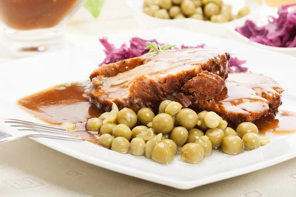 Roast pork with sauce — Stock Photo, Image