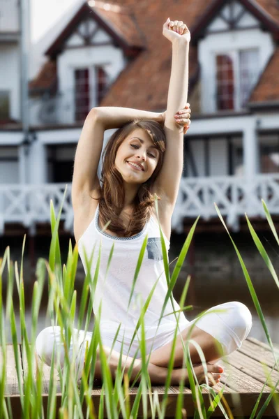 Young woman stretching exercising — Stock Photo, Image