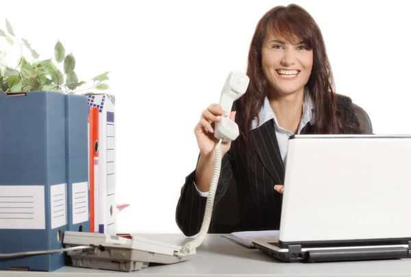 Businesswoman with telephone and smiling — Stock Photo, Image