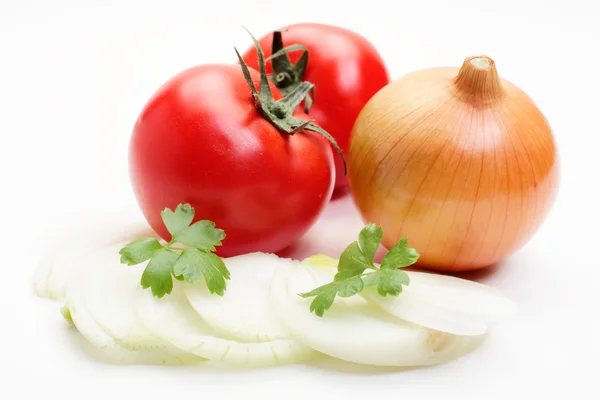 Tomatoes and onion on white background — Stock Photo, Image