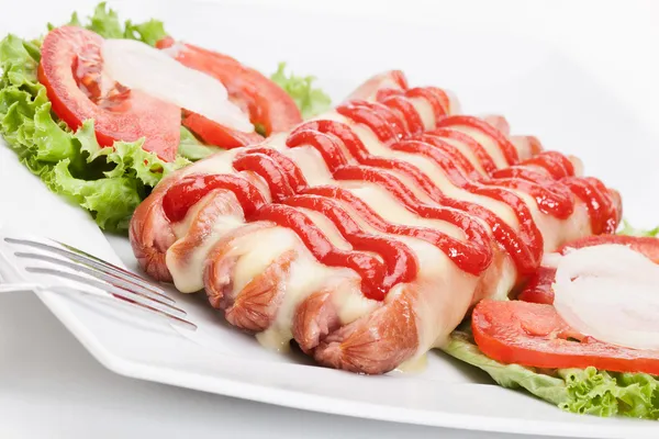 Closeup of baked sausage witch cheese. Selective focus — Stock Photo, Image