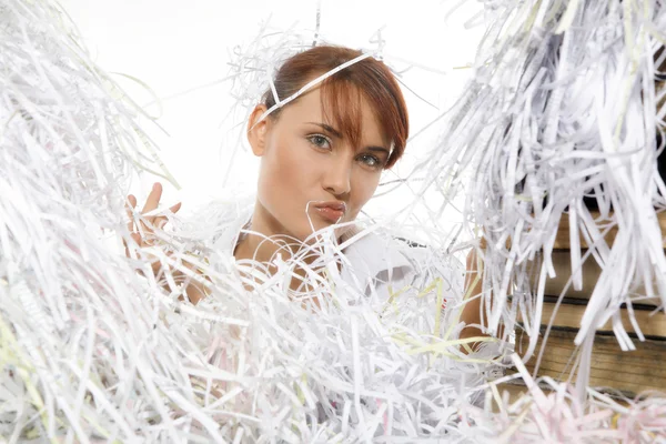 Young woman with shredded paper — Stock Photo, Image