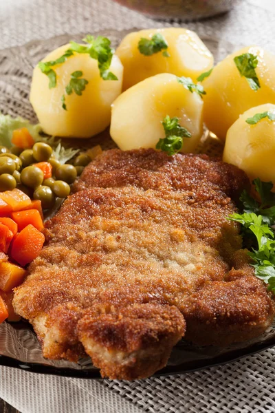 Breaded chop and potatoes — Stock Photo, Image