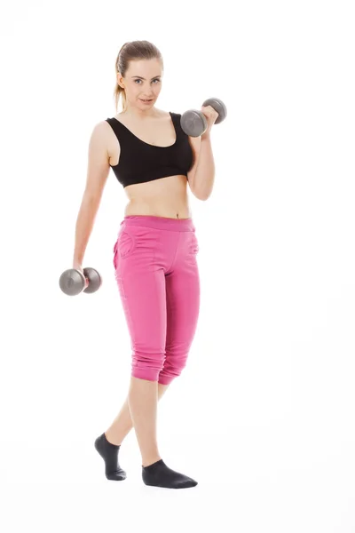 Young woman holding weights — Stock Photo, Image