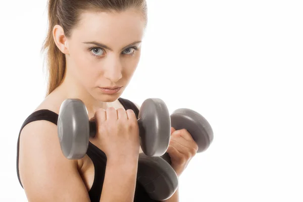 Young woman holding weights — Stock Photo, Image