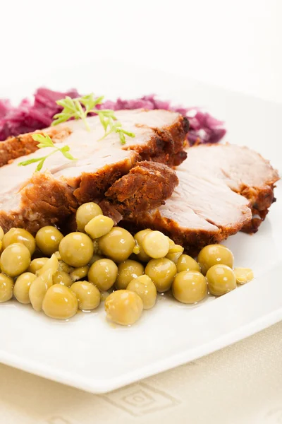 Roast pork on plate — Stock Photo, Image