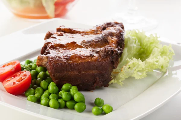 Pork spareribs on plate — Stock Photo, Image
