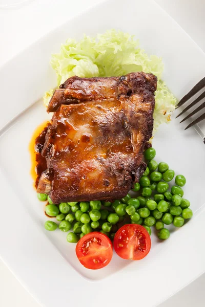 Pork spareribs on plate — Stock Photo, Image