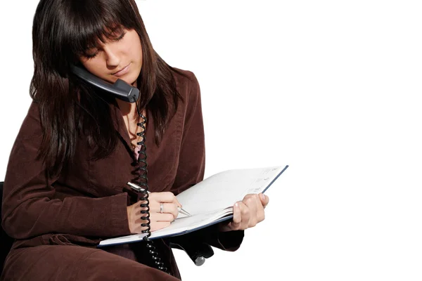 Joven oman sentado y escribiendo — Foto de Stock