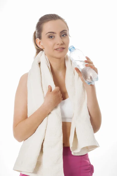 Young sporty woman with towel — Stock Photo, Image