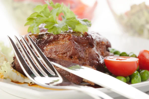 Pork spareribs on plate — Stock Photo, Image