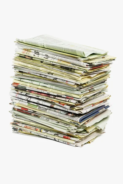 Stack of newspapers on white background — Stock Photo, Image