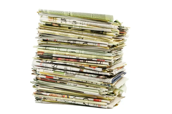 Stack av tidningar på vit bakgrund — Stockfoto