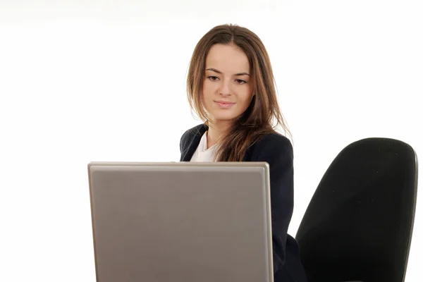 Young woman using laptop Stock Picture
