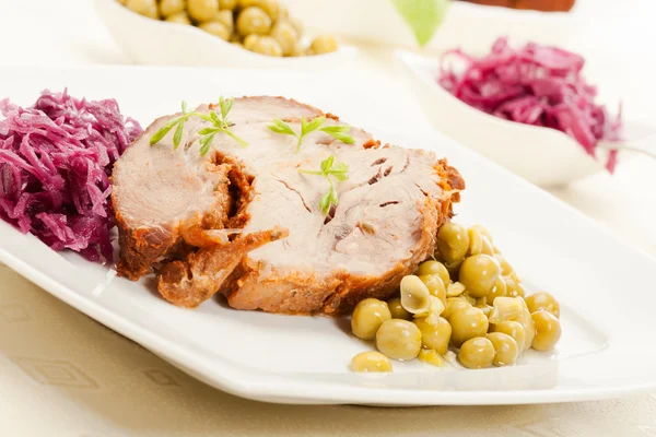 Roast pork on plate — Stock Photo, Image